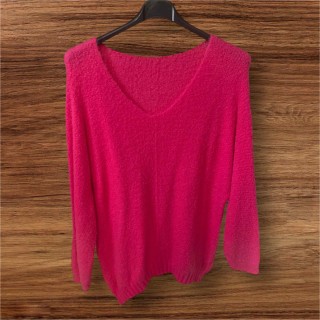 Pull étoile sur manche rose