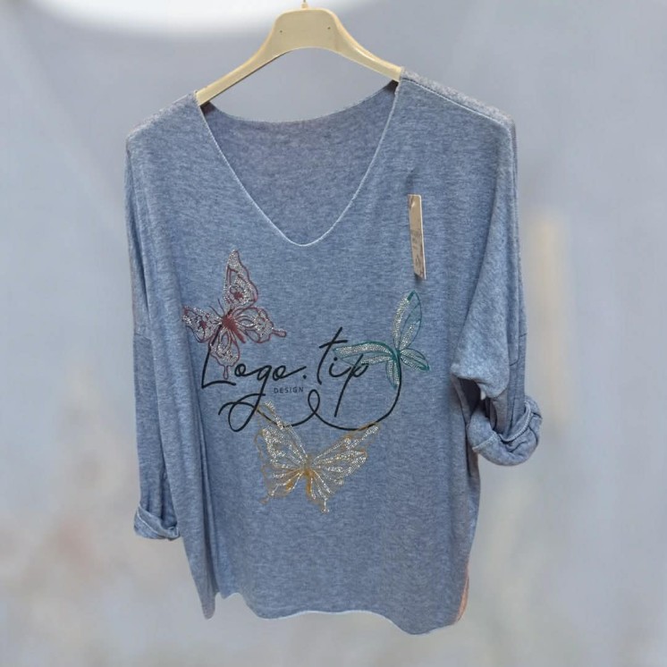 Pull papillon bleu