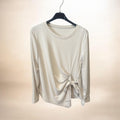Pull beige, velours, nœud