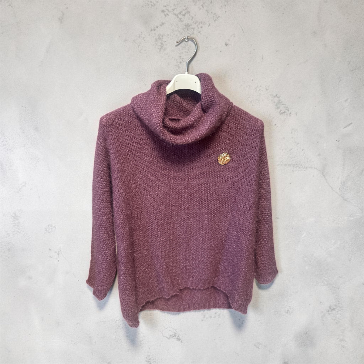 Col Roulé mauve bijoux.