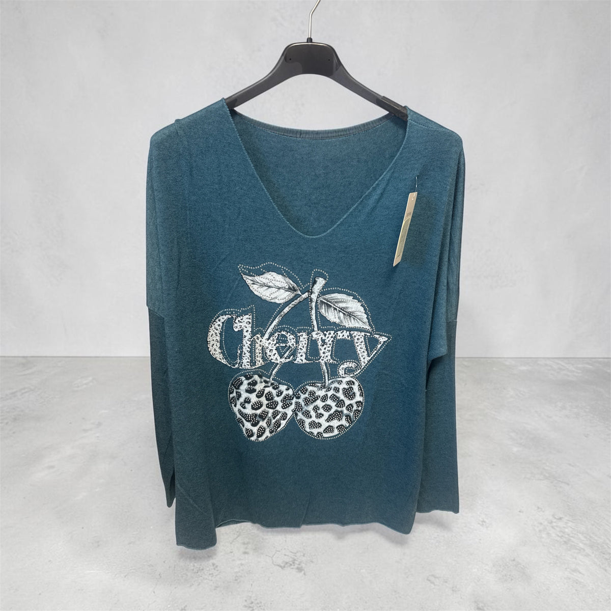 Pull cerise canard