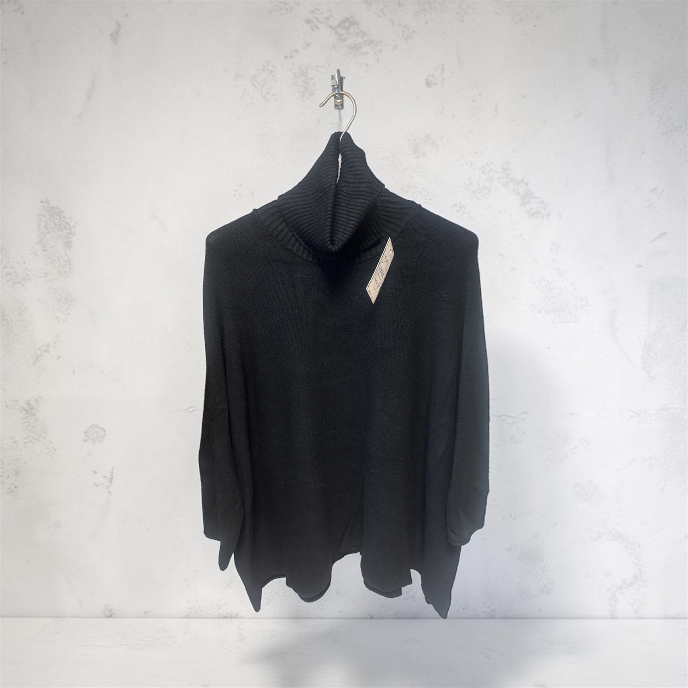 Pull noir col roulé