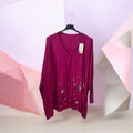 Pull fuchsia, taches dorées