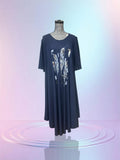 Robe noire plume